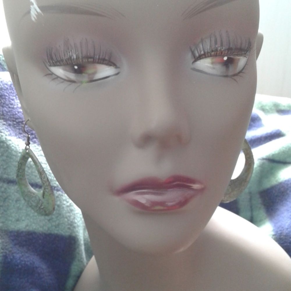 NWT.  Teardrop cut out dangle earrings